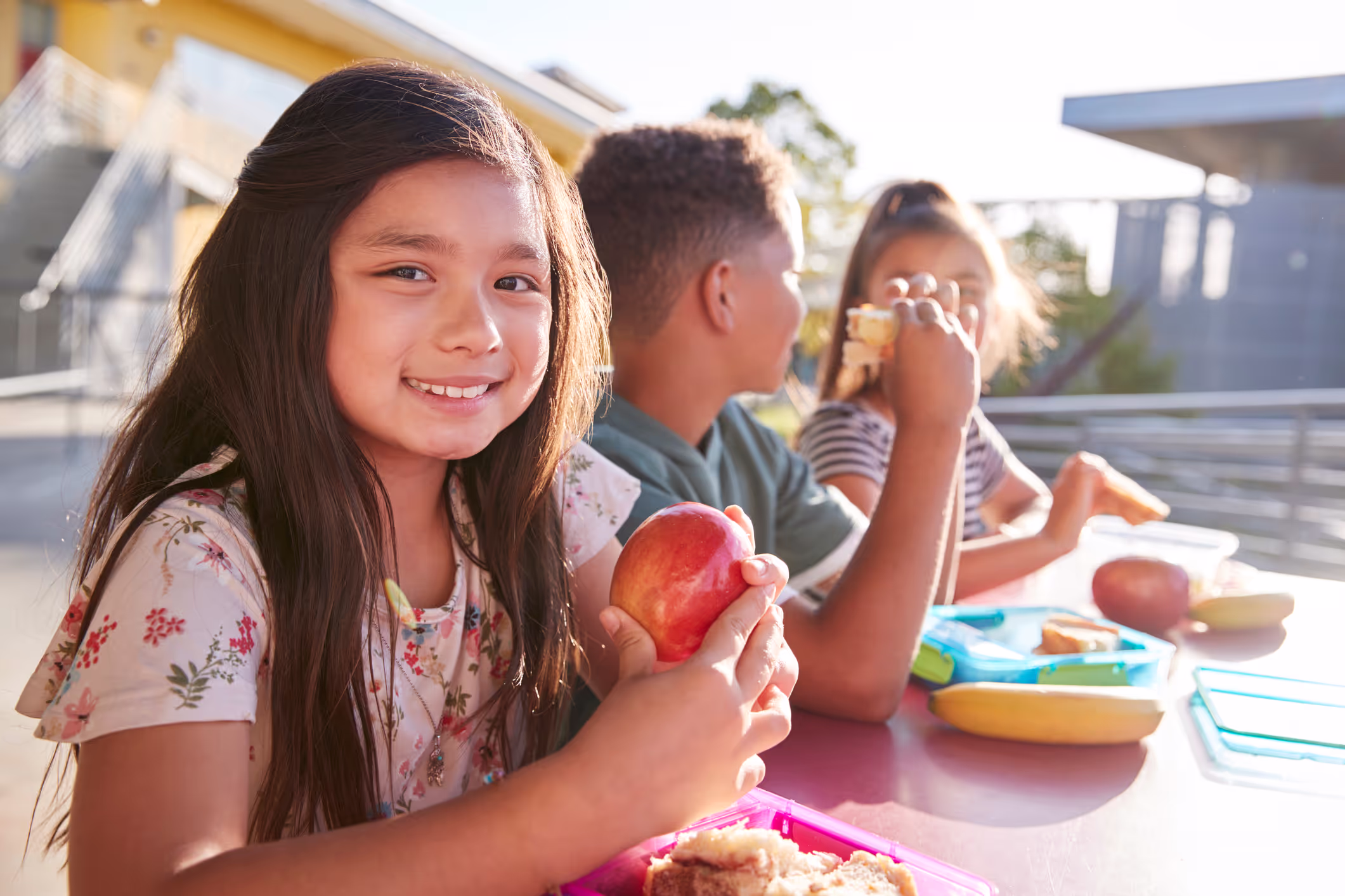 Students enjoying a healthy meal at school